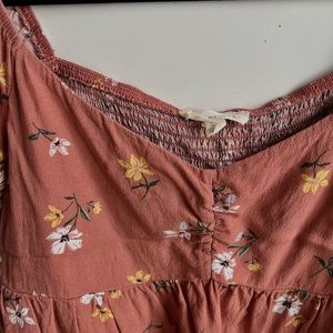 La hearts off the shoulder floral top in a size Medium with some ruching